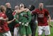 Van Der Sar is mobbed as his penalty save wins United the 2008 Champions League.