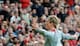 Fernando Torres celebrates an Old Trafford goal.