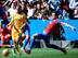 David Navarro looks to make a challenge on Barcelona forward Neymar.