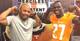Carlin Fils-aime (right) poses with UT running backs coach Robert Gillespie.