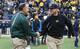 Mark Dantonio (left) and Jim Harbaugh