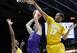 Robert Champion (22) goes up for a shot in between two Southern defenders.