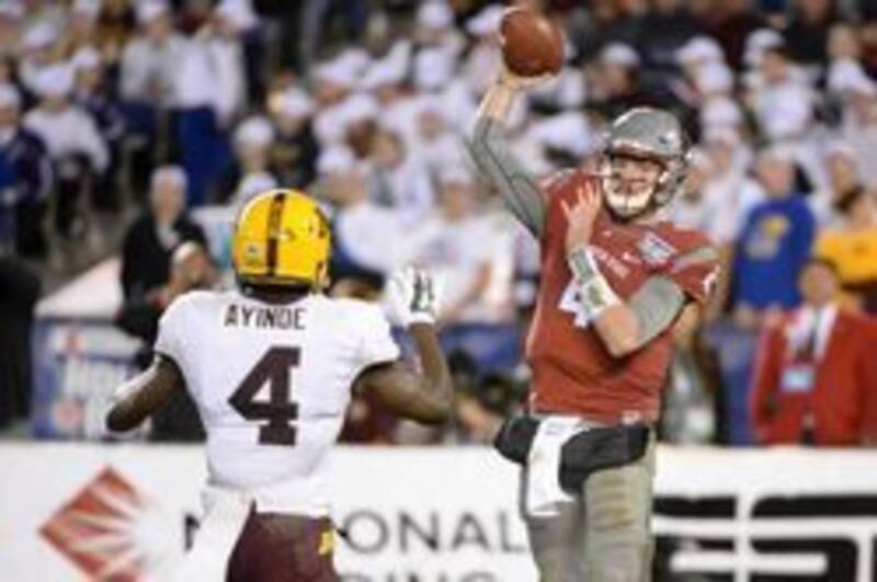 Luke Falk isn't just a system quarterback running coach Mike Leach's offense; he is also a bona fide pro prospect.