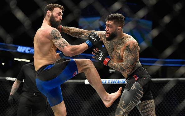 Tyson Pedro (right) knocked out Paul Craig (left) on the evening's undercard.