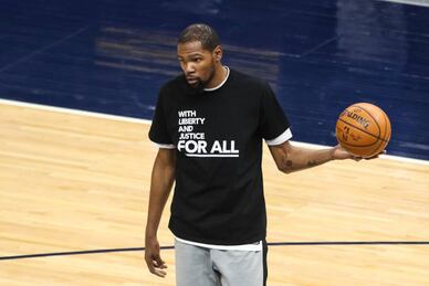 Nets, Wolves wear warm-up shirts in wake of shooting