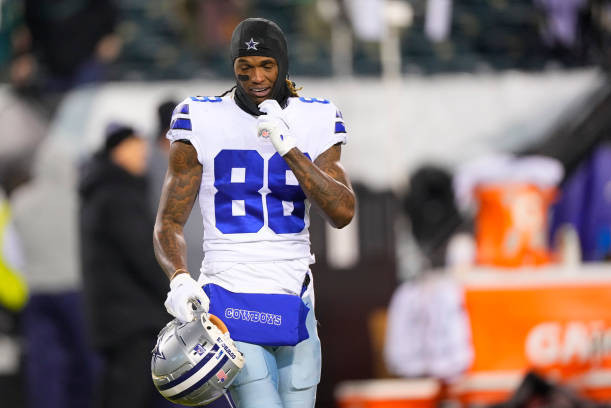 CeeDee Lamb of the Dallas Cowboys scores a touchdown as Isaiah News  Photo - Getty Images