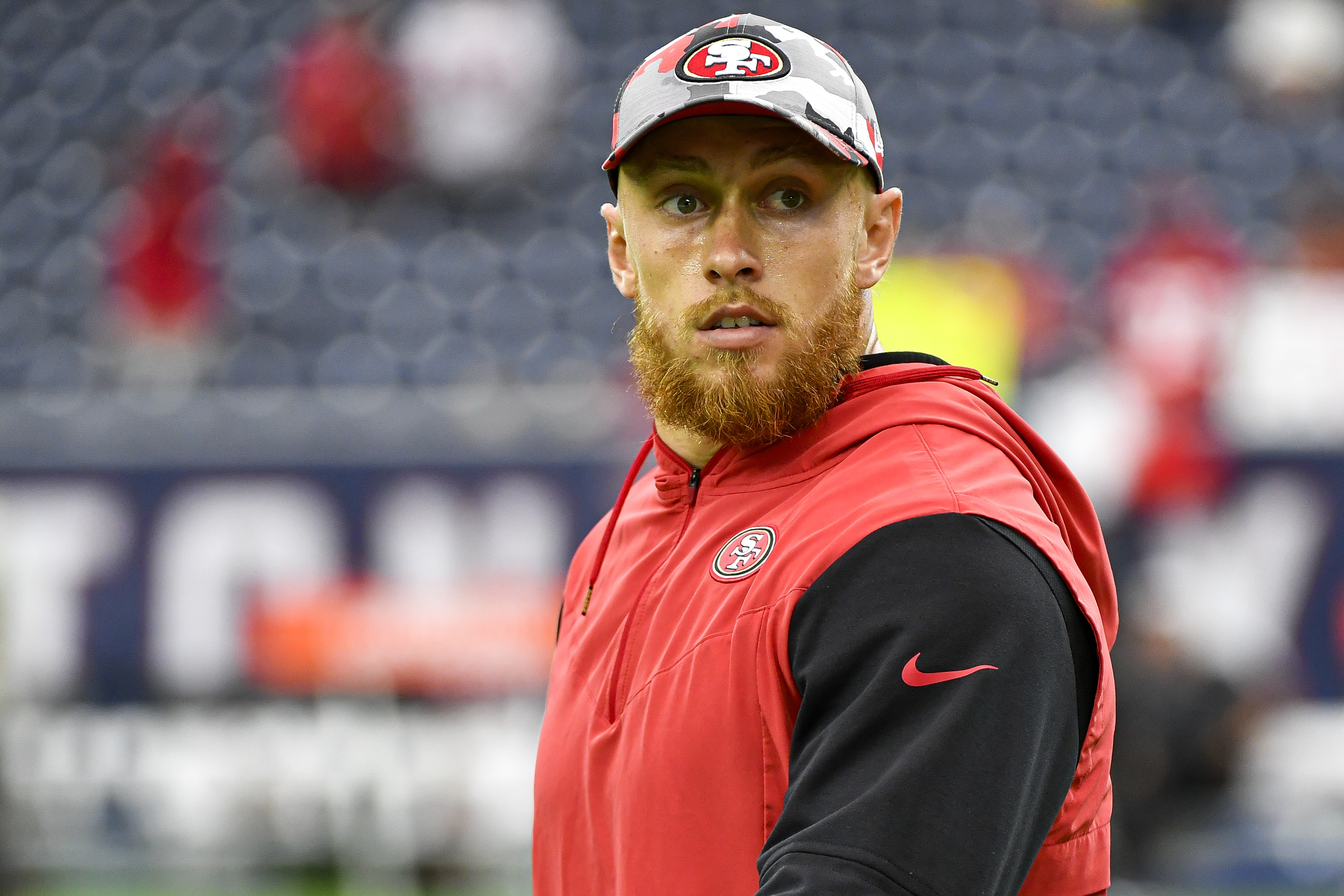 Matt Barrows on X: George Kittle wearing a signed Jimmy Garoppolo t-shirt  to the post-game podium   / X