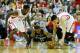HOUSTON, TX - APRIL 12: Patrick Beverley #12 and Jeremy Lin #7 of the Houston Rockets battle for a loose ball with Mike Conley #11 of the Memphis Grizzlies at the Toyota Center on April 12, 2013 in Houston, Texas. NOTE TO USER: User expressly acknowledge
