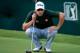 ATLANTA, GA - SEPTEMBER 19: Adam Scott of Australia looks over a birdie attempt on the 18th hole during the first round of the TOUR Championship by Coca-Cola at East Lake Golf Club on September 19, 2013 in Atlanta, Georgia. (Photo by Sam Greenwood/Getty