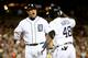 DETROIT, MI - SEPTEMBER 17: Miguel Cabrera #24 of the Detroit Tigers reacts to Torii Hunter #48 hitting a seventh inning sacrifice fly against the Seattle Mariners at Comerica Park on September 17, 2013 in Detroit, Michigan. Detroit won the game 6-2. (Pho