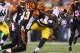 CINCINNATI, OH - SEPTEMBER 16: Felix Jones #23 of the Pittsburgh Steelersis tackled during the NFL game against the Cincinnati Bengals at Paul Brown Stadium on September 16, 2013 in Cincinnati, Ohio. (Photo by Andy Lyons/Getty Images)