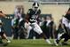 Aug 30, 2013; East Lansing, MI, USA; Michigan State Spartans running back Jeremy Langford (33) runs the ball against the Western Michigan Broncos during 1st half of a game at Spartan Stadium. Mandatory Credit: Mike Carter-USA TODAY Sports