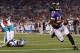BALTIMORE, MD - AUGUST 22: Wide receiver Marlon Brown #14 of the Baltimore Ravens scores a touchdown after catching a pass in front of cornerback D.J. Moore #20 of the Carolina Panthers during the second half of a preseason game at M&T Bank Stadium on Au