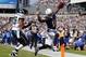 PHILADELPHIA, PA - SEPTEMBER 15: Wide receiver Eddie Royal #11 of the San Diego Chargers jumps into the end zone after making a catch for a 24 yard touchdown as cornerback Cary Williams #26 of the Philadelphia Eagles defends during the third quarter at Li