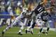 FOXBORO, MA - SEPTEMBER 12: Julian Edelman #11 of the New England Patriots catches a pass in front of Antonio Allen #39 of the New York Jets in the fourth quarter during the game at Gillette Stadium on September 12, 2013 in Foxboro, Massachusetts. (Photo