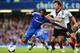 LONDON, ENGLAND - SEPTEMBER 21: Samuel Etoo (L) of Chelsea holds off the challenge of Fernando Amorebieta (R) of Fulham during the Barclays Premier League match between Chelsea and Fulham at Stamford Bridge on September 21, 2013 in London, England. (Ph