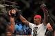 Apr 27, 2013; Newark, NJ, USA; Jon Jones (black shorts) celebrates defeating Chael Sonnen (white shorts) during UFC 159 at the Prudential Center. Mandatory Credit: Brad Penner-USA TODAY Sports