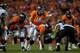 DENVER, CO - SEPTEMBER 5: Quarterback Peyton Manning #18 of the Denver Broncos audibles at the line of scrimmage against the Baltimore Ravens during the game at Sports Authority Field at Mile High on September 5, 2013 in Denver Colorado. (Photo by Dustin