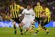 MADRID, SPAIN - APRIL 30: Kaka of Real Madrid takes on Sven Bender (L) and Lukasz Piszczek of Borussia Dortmund during the UEFA Champions League Semi Final Second Leg match between Real Madrid and Borussia Dortmund at Estadio Santiago Bernabeu on April 3