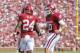 Sep 14, 2013; Norman, OK, USA; Oklahoma Sooners running back Brennan Clay (24) is congratulated by quarterback Blake Bell (10) after running for a touchdown during the first quarter against the Tulsa Golden Hurricane at Gaylord Family - Oklahoma Memorial