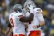 WACO, TX - DECEMBER 1: J.W. Walsh #4 of the Oklahoma State University Cowboys celebrates a 1 yard touchdown run with teammate Kye Staley #9 against the Baylor University Bears on December 1, 2012 at Floyd Casey Stadium in Waco, Texas. (Photo by Cooper Ne