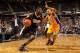 SACRAMENTO, CA - DECEMBER 26: Tyreke Evans #13 of the Sacramento Kings drives on Derek Fisher #2 of the Los Angeles Lakers at Power Balance Pavilion on December 26, 2011 in Sacramento, California. NOTE TO USER: User expressly acknowledges and agrees tha