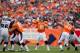 DENVER, CO - SEPTEMBER 30: Quarterback Peyton Manning #18 of the Denver Broncos looks to pass against the Oakland Raiders at Sports Authority Field Field at Mile High on September 30, 2012 in Denver, Colorado. (Photo by Justin Edmonds/Getty Images)