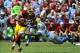 Sep 22, 2013; Landover, MD, USA; Washington Redskins tight end Jordan Reed (86) runs after a reception as Detroit Lions safety Glover Quin (27) defends during the first half at FedEX Field. Mandatory Credit: Brad Mills-USA TODAY Sports