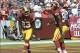 Sep 22, 2013; Landover, MD, USA; Washington Redskins cornerback DeAngelo Hall (23) celebrates with Washington Redskins linebacker London Fletcher (59) after scoring a touchdown against the Detroit Lions at FedEX Field. Mandatory Credit: Brad Mills-USA TOD