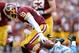 LANDOVER, MD - SEPTEMBER 22: Robert Griffin III #10 of the Washington Redskins fumbles and recovers the ball after being sacked in the second quarter during a game against the Detroit Lions at FedExField on September 22, 2013 in Landover, Maryland. (Pho
