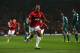 MANCHESTER, ENGLAND - MARCH 05: Nani of Manchester United celebrates after Sergio Ramos of Real Madrid scored an own goal during the UEFA Champions League Round of 16 Second leg match between Manchester United and Real Madrid at Old Trafford on March 5,