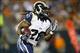 Aug 8, 2013; Cleveland, OH, USA; St. Louis Rams running back Daryl Richardson (26) runs the ball in the second quarter against the Cleveland Browns at FirstEnergy Stadium. Mandatory Credit: Rick Osentoski-USA TODAY Sports