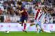 MADRID, SPAIN - SEPTEMBER 21: Lionel Messi of FC Barcelona duels for the ball with Raul Baena of Rayo Vallecano during the La Liga match between Rayo Vallecano de Madrid and FC Barcelona at Estadio Teresa Rivero on September 21, 2013 in Madrid, Spain. (