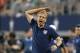 Jul 24, 2013; Arlington, TX, USA; USA head coach Jurgen Klinsmann reacts to play on the field against Honduras at Cowboys Stadium. Klinsmann was throw out of the game for this reaction. USA beat Honduras 3-1. Mandatory Credit: Matthew Emmons-USA TODAY Spo