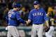 OAKLAND, CA - SEPTEMBER 03: A.J. Pierzynski #12 and Joe Nathan #36 of the Texas Rangers celebrate defeating the Oakland Athletics 5-1 at O.co Coliseum on September 3, 2013 in Oakland, California. (Photo by Thearon W. Henderson/Getty Images)