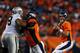 DENVER, CO - SEPTEMBER 23: Peyton Manning #18 of the Denver Broncos looks to pass against the Oakland Raiders in the first quarter at Sports Authority Field at Mile High on September 23, 2013 in Denver, Colorado. (Photo by Justin Edmonds/Getty Images)