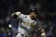 CHICAGO, IL - SEPTEMBER 23: Starling Marte #6 of the Pittsburgh Pirates runs up the first base line after hitting a solo home run during the ninth inning against the Chicago Cubs at Wrigley Field on September 23, 2013 in Chicago, Illinois. The Pirates wo