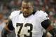 Oct 28 2012; Denver, CO, USA; New Orleans Saints guard Jahri Evans (73) reacts from his bench late in the fourth quarter of the game against the Denver Broncos at Sports Authority Field. The Broncos defeated the Saints 34-14. Mandatory Credit: Ron Chenoy-