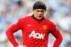 MANCHESTER, ENGLAND - SEPTEMBER 22: Wayne Rooney of Manchester United looks on during the Barclays Premier League match between Manchester City and Manchester United at the Etihad Stadium on September 22, 2013 in Manchester, England. (Photo by Laurence