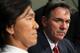 OAKLAND, CA - DECEMBER 14: Oakland Athletics general manager Billy Beane (R) looks on as Hideki Matsui (L) speaks during a press conference where he was introduced as the newest member of the Oakland Athletics at Oakland-Alameda County Coliseum on Decemb