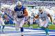 Sep 15, 2013; Indianapolis, IN, USA; Indianapolis Colts tight end Coby Fleener (80) catches a pass for a touchdown during the second quarter against the Miami Dolphins at Lucas Oil Stadium. Mandatory Credit: Andrew Weber-USA TODAY Sports