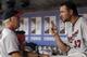 ARLINGTON, TX - AUGUST 31: Pitching coach Rick Anderson #40 of the Minnesota Twins talks with starting pitcher Mike Pelfrey #37 in the dugout in the eighth inning of a baseball game against the Texas Rangers at Rangers Ballpark in Arlington on August 31,