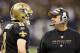 NEW ORLEANS, LA - DECEMBER 26: Quarterback Drew Brees #9 and Head Coach Sean Payton of the New Orleans Saints talk on the sidelines during a game against the Atlanta Falcons at Mercedes-Benz Superdome on December 26, 2011 in New Orleans, Louisiana. The