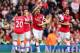 LONDON, ENGLAND - SEPTEMBER 22: Aaron Ramsey (C) of Arsenal celebrates scoring during the Barclays Premier League match between Arsenal and Stoke City at Emirates Stadium on September 22, 2013 in London, England. (Photo by Ian Walton/Getty Images)