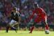 LIVERPOOL, ENGLAND - SEPTEMBER 21: Daniel Sturridge of Liverpool moves away from Jay Rodriguez of Southampton during the Barclays Premier League match between Liverpool and Southampton at Anfield on September 21, 2013 in Liverpool, England. (Photo by Cl