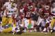 NORMAN, OK - OCTOBER 27: Jalen Saunders #18 of the Oklahoma Sooners is tackled after catching a pass against the Notre Dame Fighting Irish at Gaylord Family Oklahoma Memorial Stadium on October 27, 2012 in Norman, Oklahoma. The Fighting Irish defeated
