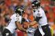 DENVER, CO - SEPTEMBER 5: Joe Flacco #5 of the Baltimore Ravens hands the ball off to teammate Ray Rice #27 of the Baltimore Ravens in the first quarter against the Denver Broncos during the game at Sports Authority Field at Mile High on September 5, 2013