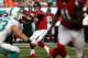 MIAMI GARDENS, FL - SEPTEMBER 22: Quarterback Matt Ryan #2 of the Atlanta Falcons throws against the Miami Dolphins at Sun Life Stadium on September 22, 2013 in Miami Gardens, Florida. The Dolphins defeated the Falcons 27-23. (Photo by Marc Serota/Gett