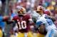 LANDOVER, MD - SEPTEMBER 22: Robert Griffin III #10 of the Washington Redskins throws a pass in the third quarter during a game against the Detroit Lions at FedExField on September 22, 2013 in Landover, Maryland. (Photo by Patrick McDermott/Getty Images