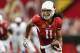 GLENDALE, AZ - SEPTEMBER 15: Wide receiver Larry Fitzgerald #11 of the Arizona Cardinals runs with the football after a reception against the Detroit Lions during the NFL game at the University of Phoenix Stadium on September 15, 2013 in Glendale, Arizon